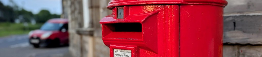 Cropped picture of a red postbox in Bo'ness.